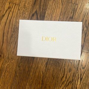Dior sunglasses box, price tag, auth book, and dust cloth